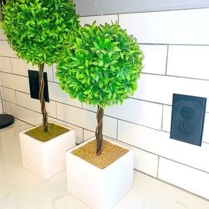 Green and white artificial tree plants